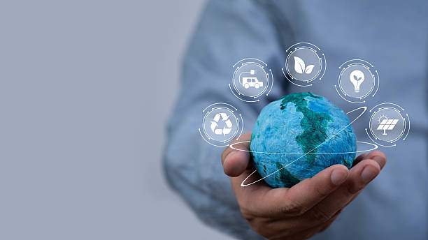 istock A hand holding a globe with icons representing sustainability, recycling, and environmental care, emphasizing global awareness and responsibility. 2232363150