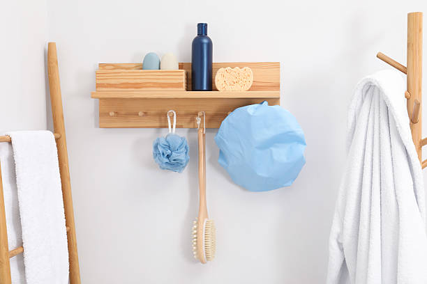istock Shower cap and bath accessories on rack indoors 2232363738