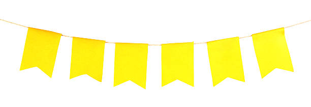 istock Yellow party flags isolated on white. Festive decor 2232363849