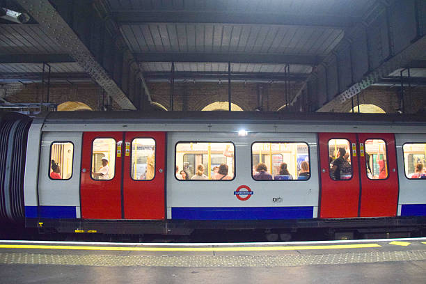 London, UK - August 25 2025: a view from the platform of a London Underground train with passengers