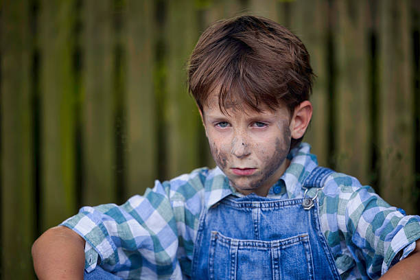 8-year-old boy bored and unhappy.