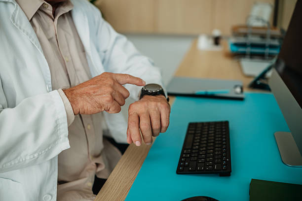 istock Healthcare worker utilizing modern technology to monitor patient data in a clinical setting 2232369048