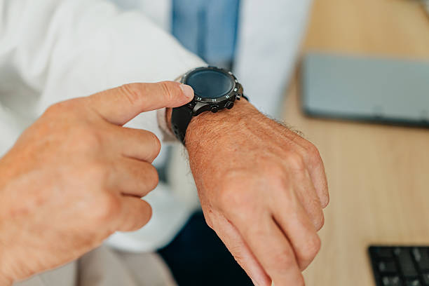 istock Healthcare professional analyzes data on smart device during a medical consultation in a hospital setting 2232369868