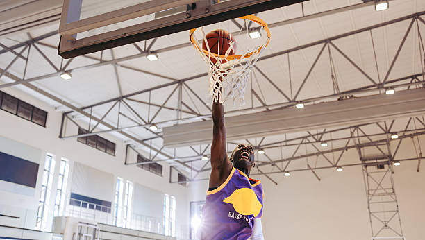 istock Air time: Young man soars for the slam 2232372879