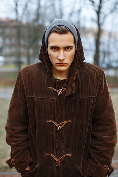 istock Angry man on a cloudy autumn day 2232374165