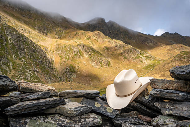 istock Cowboy hat in the mountain 2232374356