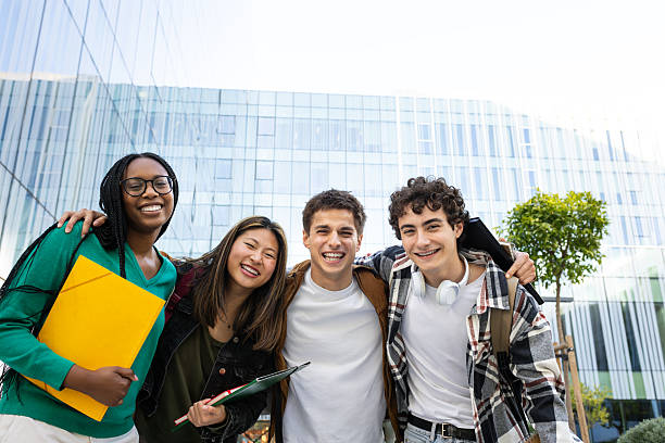istock Happy multi-ethnic students smiling outside university building 2232375443