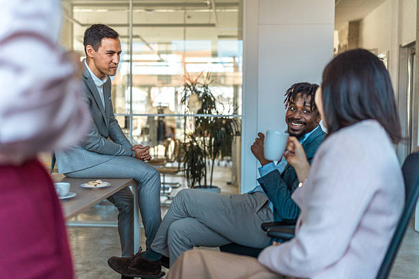 istock Business Executives Having a Coffee Break in Office Setting 2232376503
