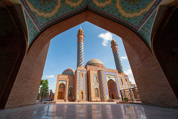 Historical Imamzadeh Mosque and Mausoleum through the arch of its gate in the city of Ganja, Azerbaijan