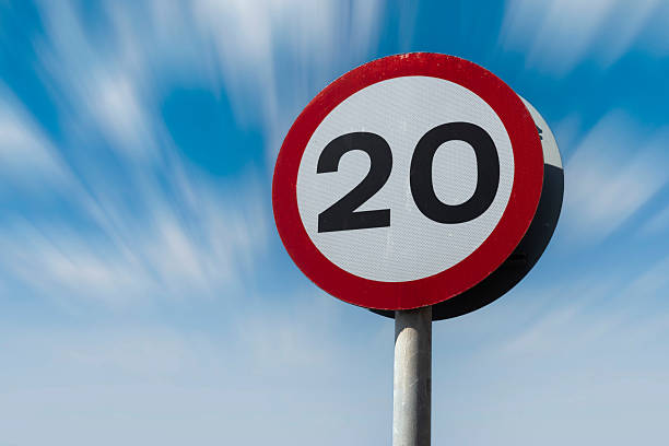 istock Twenty miles an hour speed limit against blue sky 2232388905