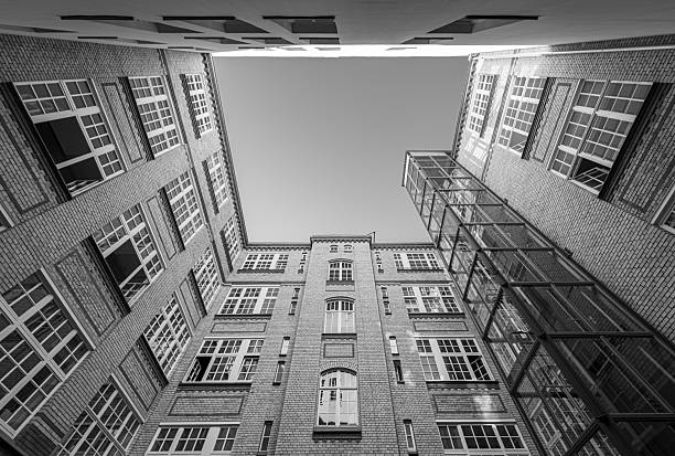 Amsterdam's buildings and streets blend picturesque canals, historic architecture, and vibrant urban life, creating a charming and iconic cityscape.
