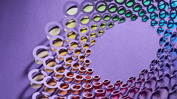 istock Layered Circular Mandala Paper Cutout with Vibrant Rainbow Gradient on Purple 2232392728