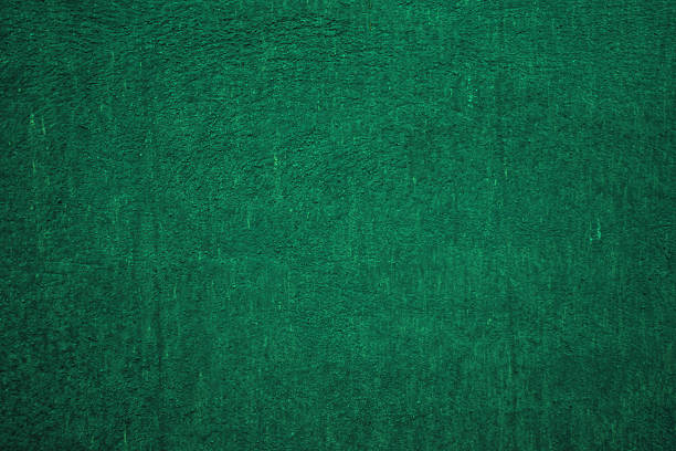 istock Dark green matte background, embossed textured wall. 2232396195