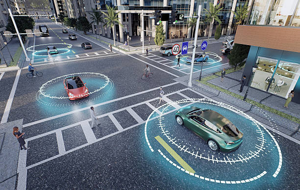istock 3D conceptual render, top view of an urban scene with autonomous vehicles emitting object recognition signals 2232397771