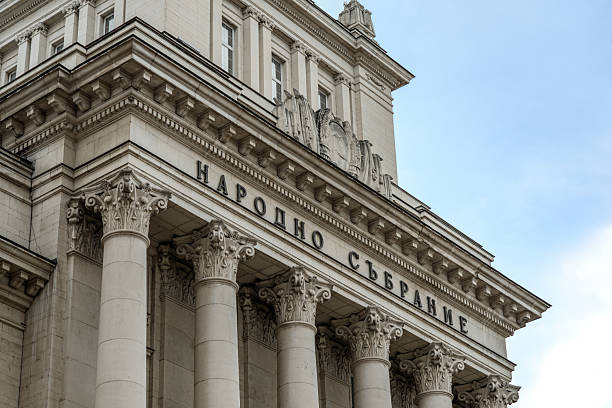 Sofia, Bulgaria - August 22, 2025: The National Assembly building features neoclassical architecture with Corinthian columns and ornate decorative details, representing an important political and historic landmark.