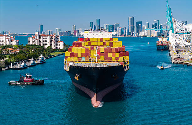 istock Freight container loaded on cargo vessel. Aerial ship with container. Cargo business. Container ship. Shipping logistics. Commercial shipping. Cargo ship in sea, aerial view. Cargo ship deck 2232403098