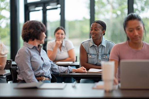 istock Casual Classroom Interaction of Adults During an Engaged Study Session 2232403911