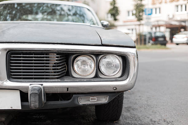 istock Before retro car with a headlight. muscle car 2232405873