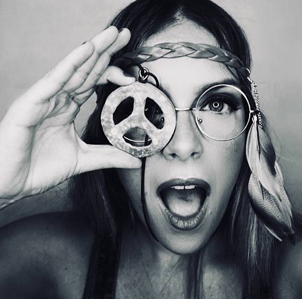 Magazine cover model in black and white, fashion photoshoot, wearing fantasy-inspired makeup and sunglasses
