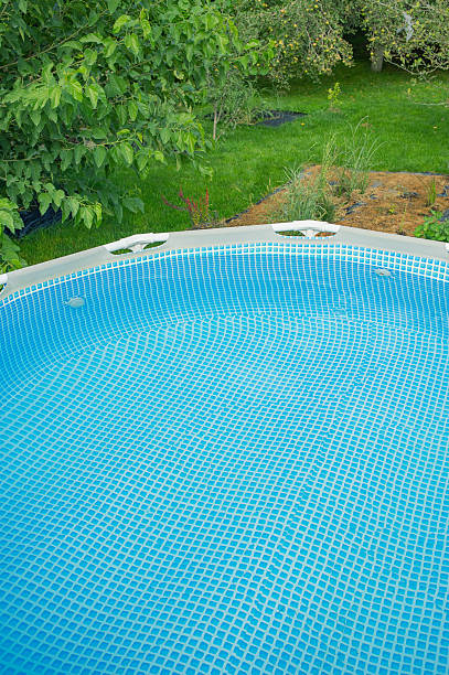 istock Frame pool for relaxation with clean water in the garden. 2232417152