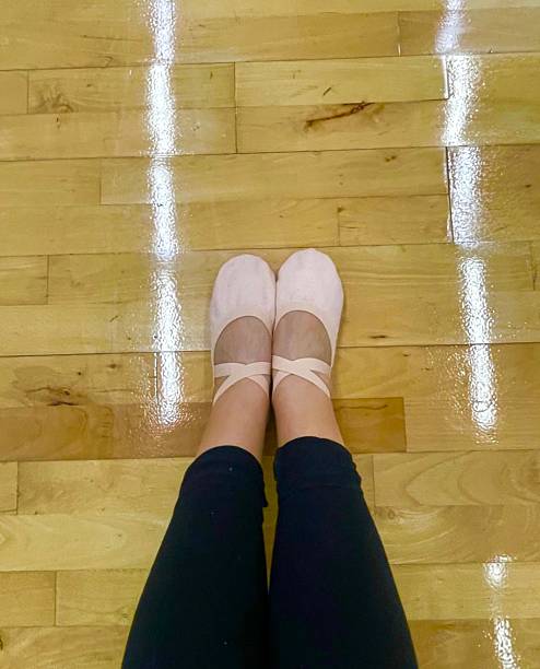 istock Ballet shoes on a dancer’s legs 2232417299