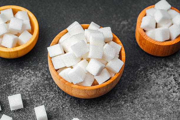 istock Cubes of sugar in wooden bowls create a visually appealing kitchen display 2232435305