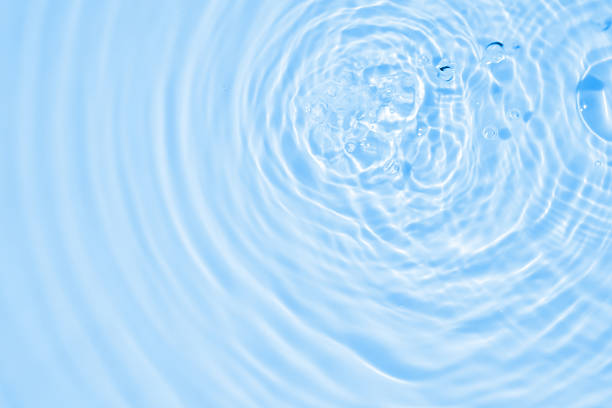 istock Abstract transparent water shadow surface texture natural ripple on blue background 2232439080