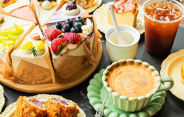 istock Plated Assorted Cakes Symbolizing Celebration and Sharing Moments, coffee cup. 2232442437