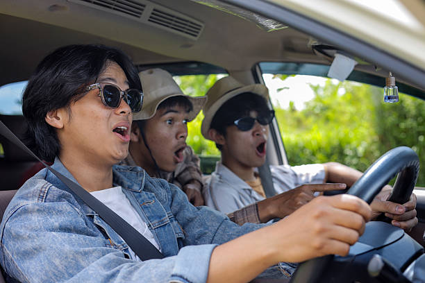istock Shocked Man Driving a Car 2232443262