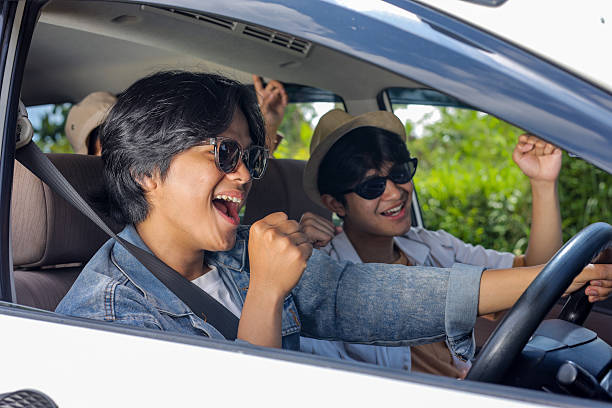 istock Friends Singing Along During a Road Trip 2232443270