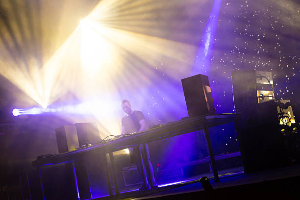 istock Dj playing techno music on the stage 2232443417