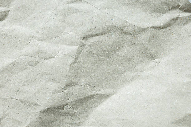 istock close up on crumpled brown paper background texture for ads design template or add content on display concept 2232446751