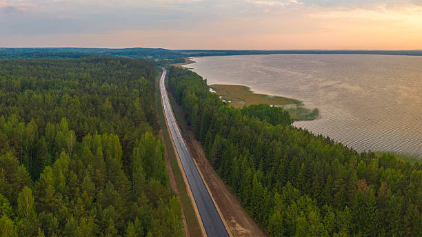 istock a large lake in a summer forest 2232449534