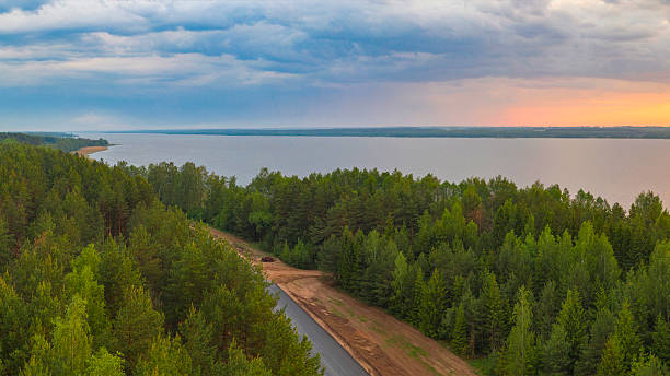istock a large lake in a summer forest 2232449577