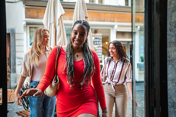 Diverse Female Group Arriving for Meal at Quaint Eatery