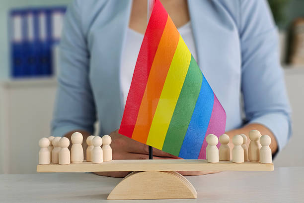 istock Supporting diversity and inclusion through a rainbow flag display during a community event 2232452495