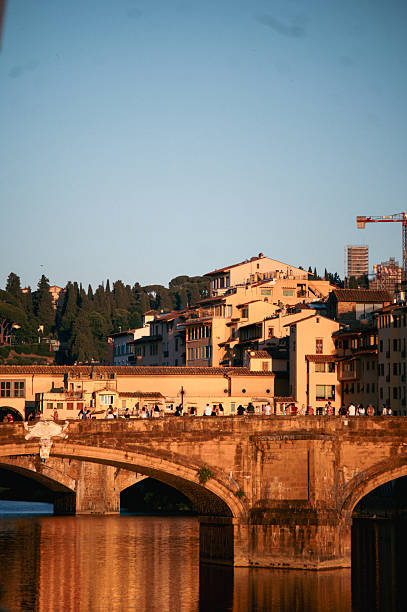 Professional images of Florence and Pisa including Duomo Cathedral, Arno river, Ponte Vecchio, sunset scenes, and romantic moments in Tuscany.