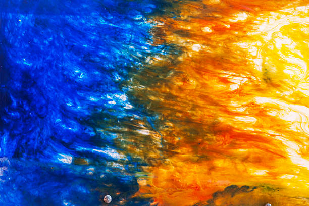 Close up view of abstract blue and orange color pattern creating artistic background.