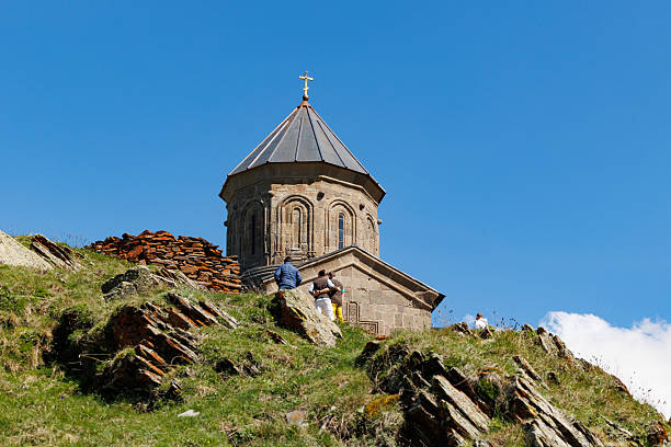 Gergeti, May 22, 2025. Scenic view of the Gergeti Trinity Church in the Caucasus Mountains, northern Georgia