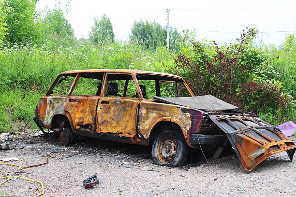 An old abandoned machine. Car after fire.