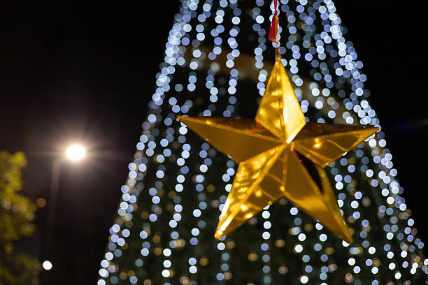 Golden stars blurred focus background with beautiful bokeh lights.