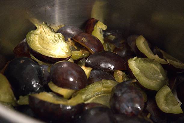 istock Plum jam cooking, chopped plums in pot, close up 2232462882