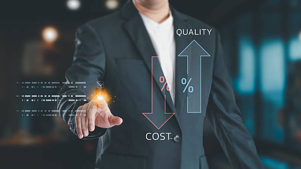 istock A businessman in a suit interacts with a futuristic holographic interface, touching a screen to manage business strategy, balancing between increasing quality and decreasing cost in a modern office. 2232464878
