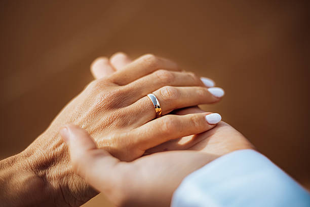 istock Wedding Ring Close-Up on Bride's Hand 2232468782