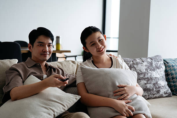 istock Family Time Relaxation on Sofa 2232473407