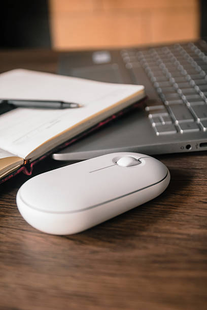 istock Home Office Essentials on a Wooden Desk 2232475884