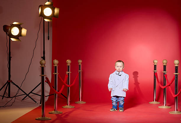 istock Little Toddler Gentleman on the Red Carpet 2232479680