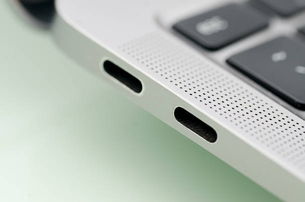istock USB-C & Thunderbolt Ports on Modern Laptop  Clean Bright Close-Up with Speaker Grille 2232481763