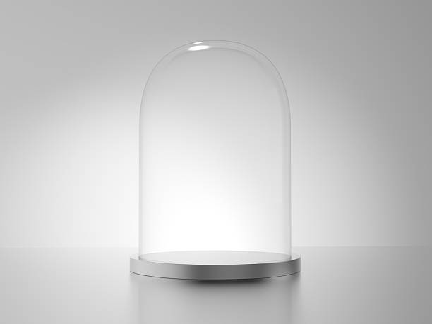 Empty glass dome with metal base isolated on gray background. Cloche.