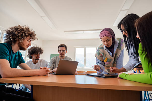istock A group of diverse college students studying together or young business team working on a project plan. 2232482434